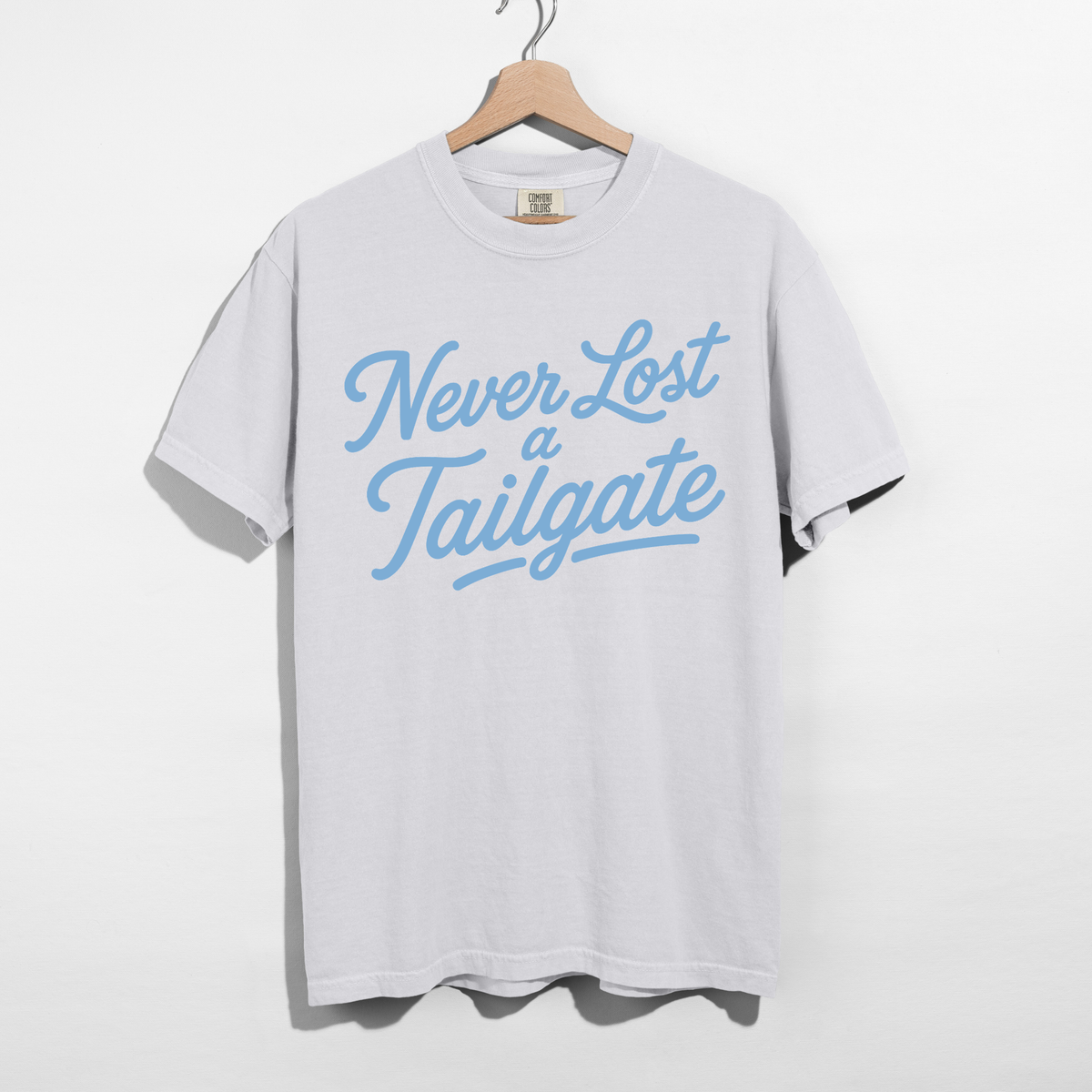 Never Lost a Tailgate Baby Blue Graphic Tee – Carolina Blue Football Game Day Shirt
