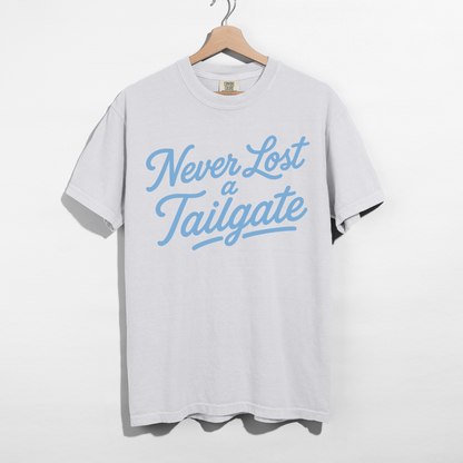 Never Lost a Tailgate Baby Blue Graphic Tee – Carolina Blue Football Game Day Shirt